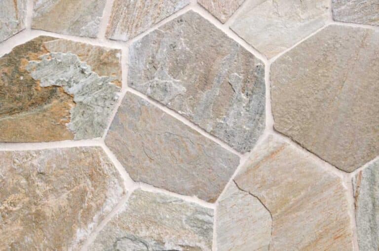 Close view of natural flagstone paving with pale mortar joints