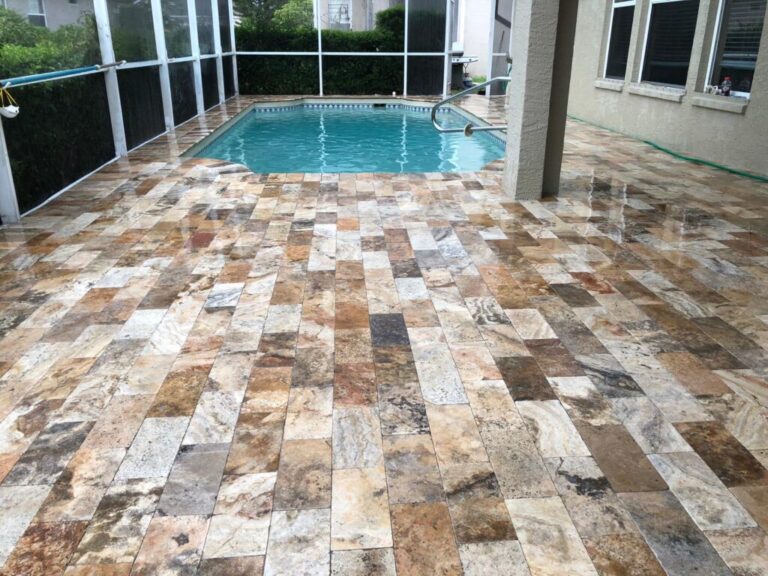 Travertine stone pool deck in San Diego after professional stone and tile cleaning